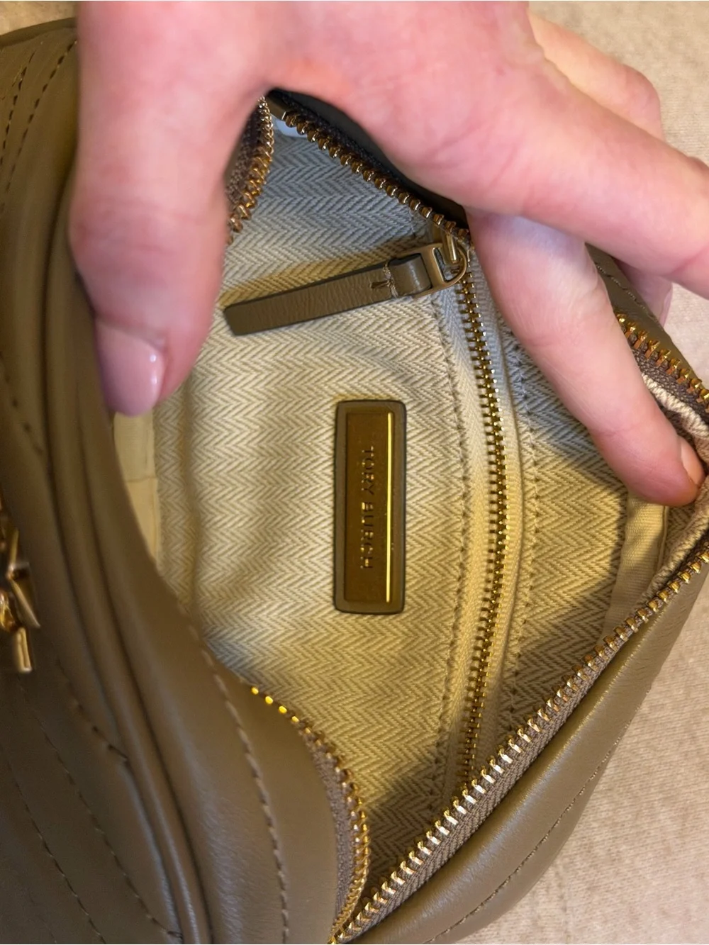 Tory Burch Kira Chevron Small Camera Bag in the color “Sandpiper”